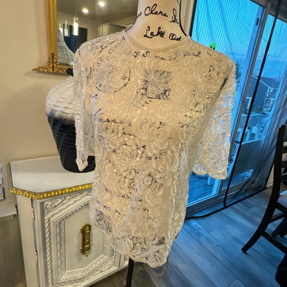 Elegant Cream Lace Top
Vintage SCALA MILAN PARIS LOS ANGELES DRESS